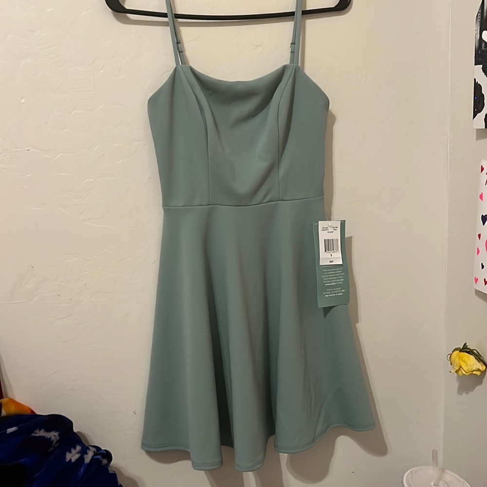 Sage green dress, size 3 in juniors?, brand new with tags on it. Never been worn